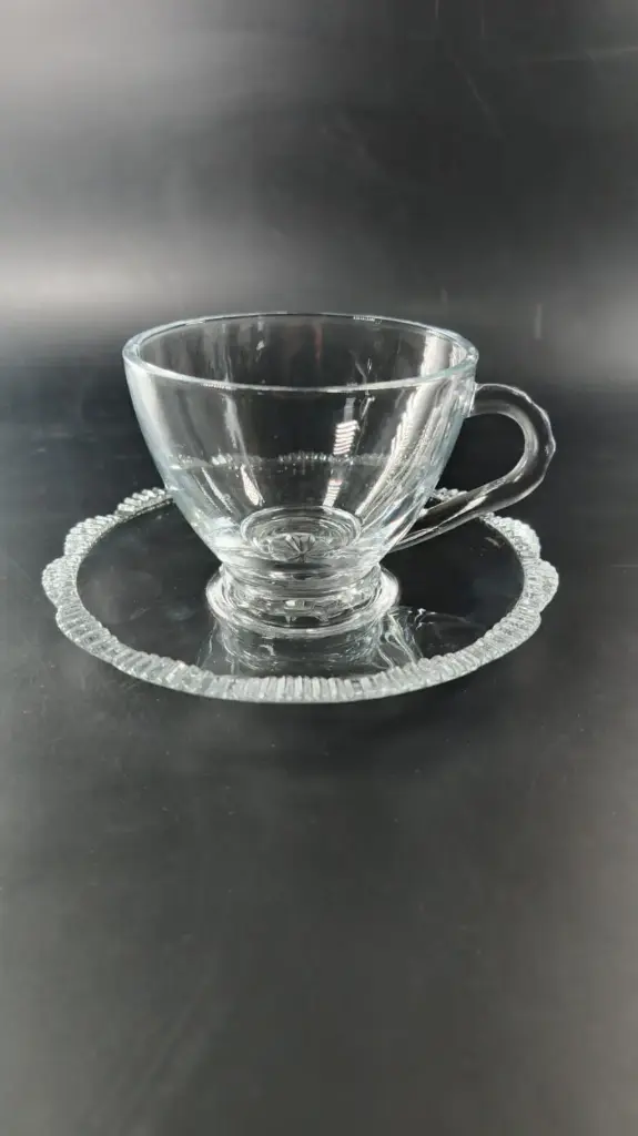 GLASS CUP AND SAUCER SET